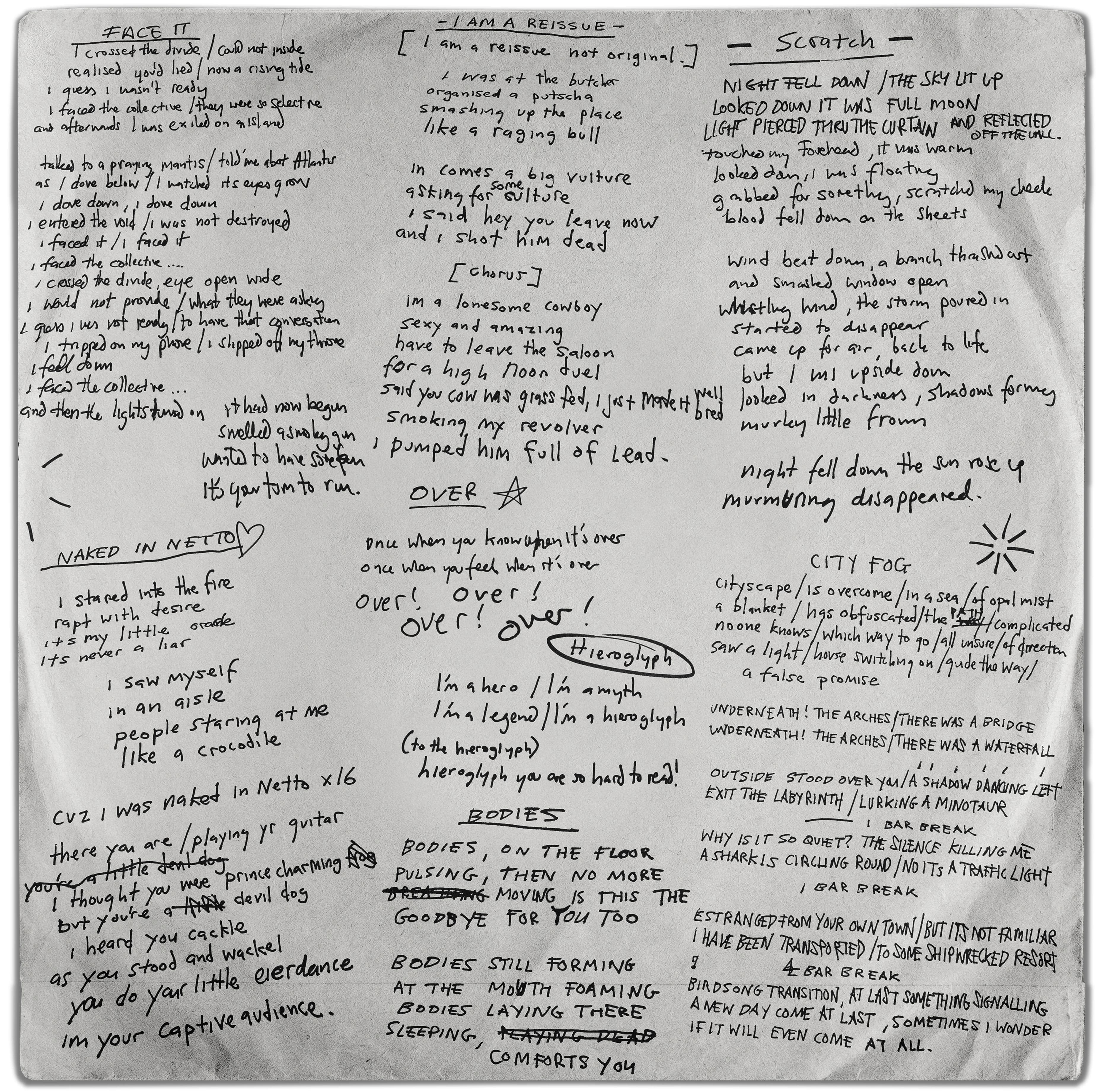 Handwritten lyrics and small drawings covering a pale inner sleeve