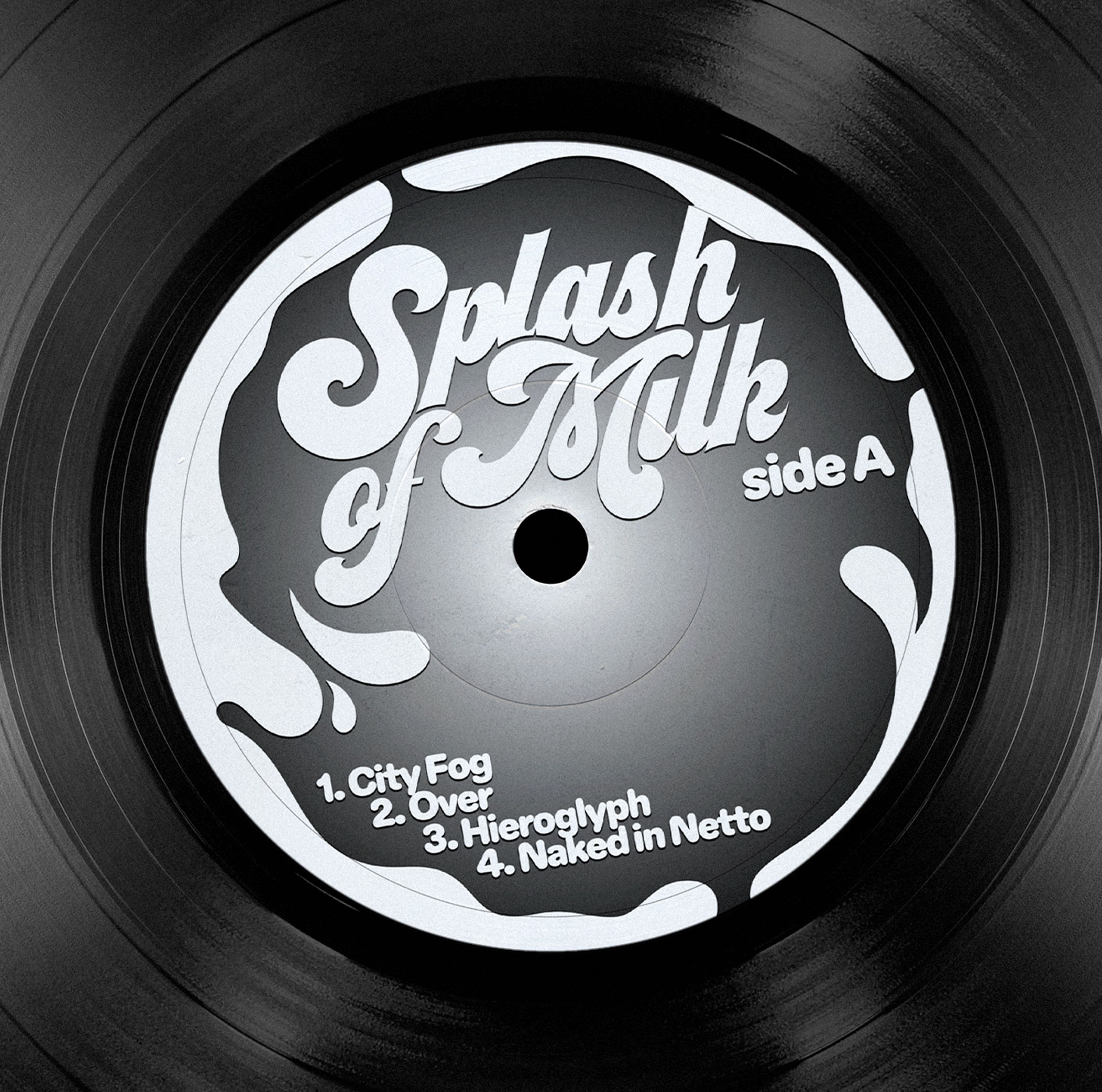 Black vinyl with a side A label featuring white script and milk splash shapes