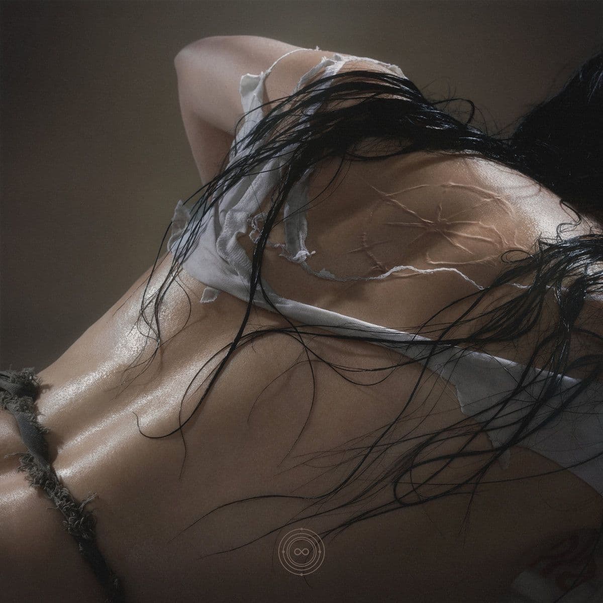 Close crop of wet dark hair across bare shoulders and a pale garment in warm light