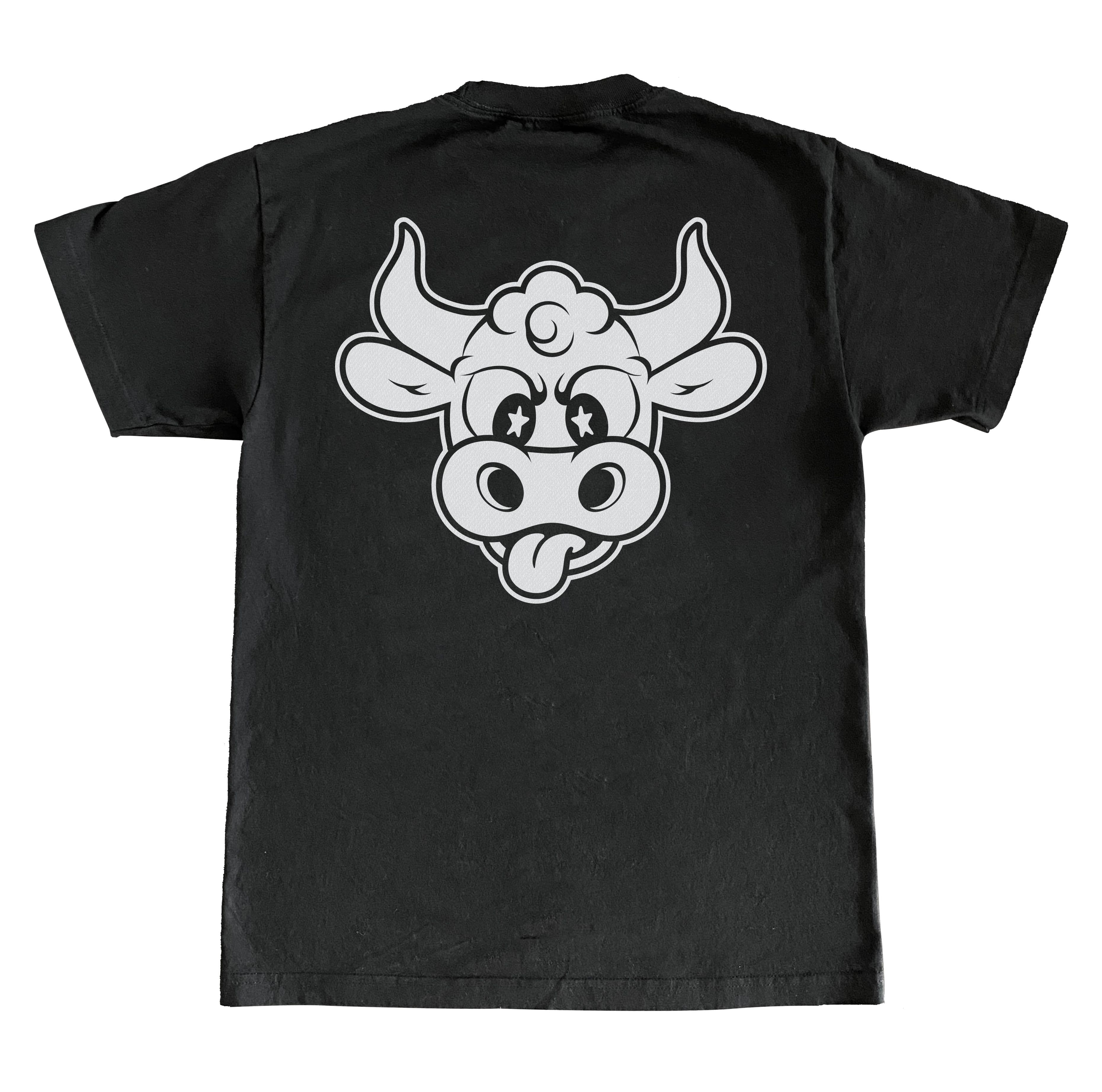 Back of a black T shirt with a large white cartoon cow head