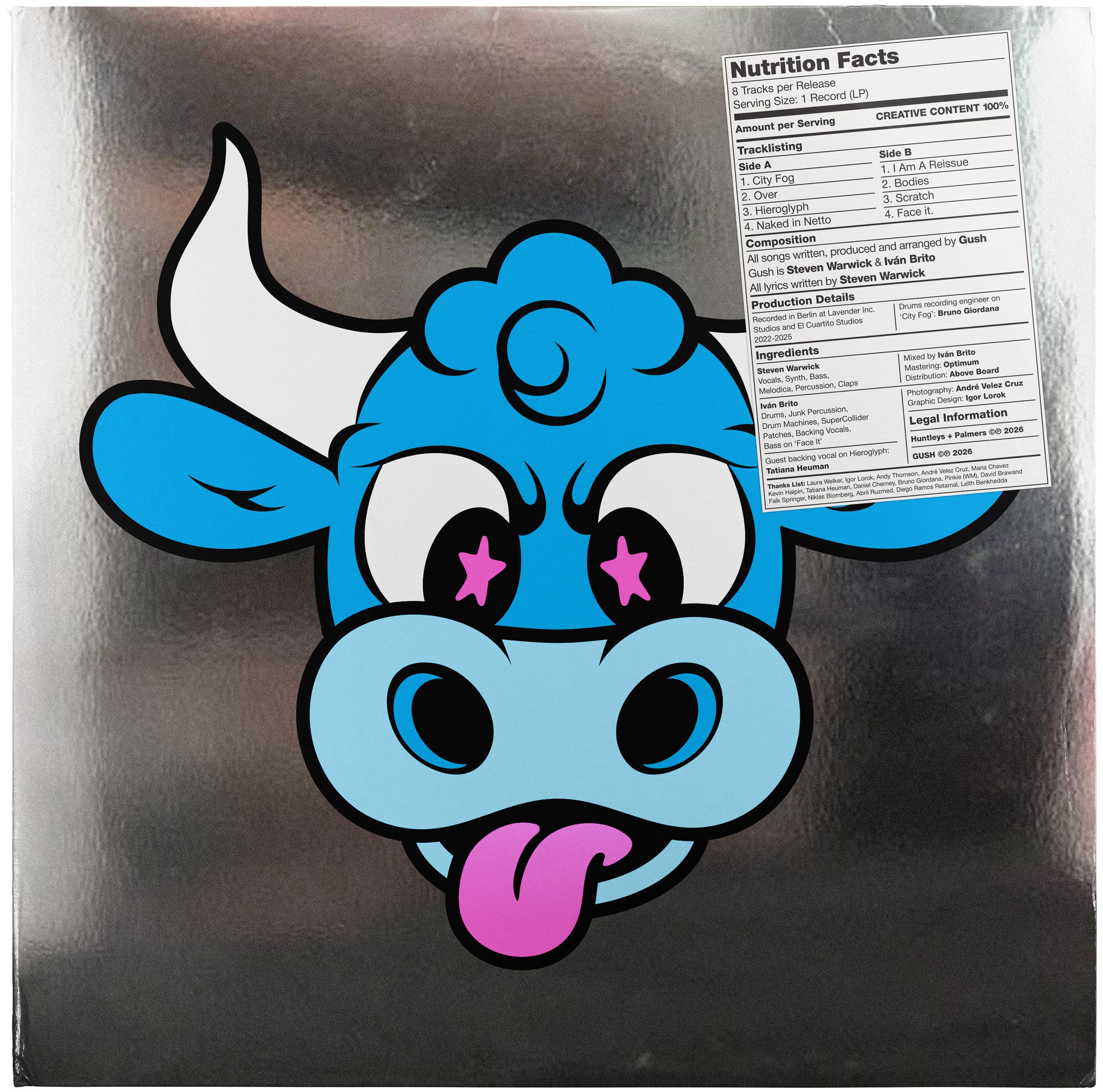 Blue cartoon cow head and a nutrition label on a reflective silver LP sleeve